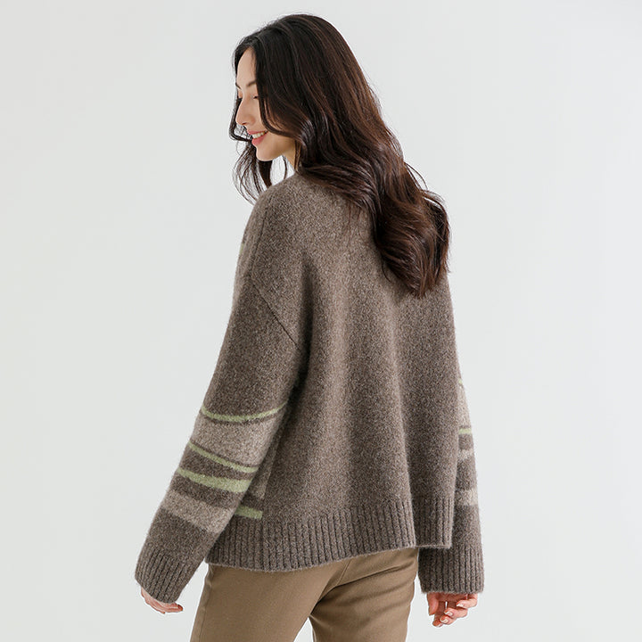 Add sophistication to your wardrobe with the Above Land Jacquard Cardigan. Crafted from a luxurious yak wool blend, this elegant outerwear piece features intricate jacquard patterns, perfect for layering over any outfit. Cozy, stylish, and versatile for every season.



