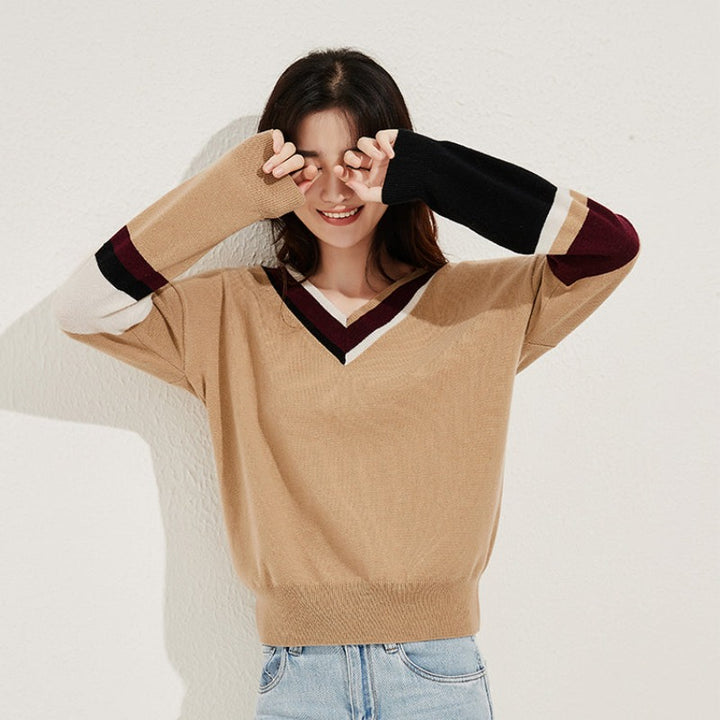 Stand out with the Himalaya Women's V-neck Colorblock Sweater. Crafted from a luxurious yak and wool blend, this stylish sweater offers exceptional warmth, softness, and a unique colorblock design. Perfect for elevating your casual wardrobe with cozy elegance.