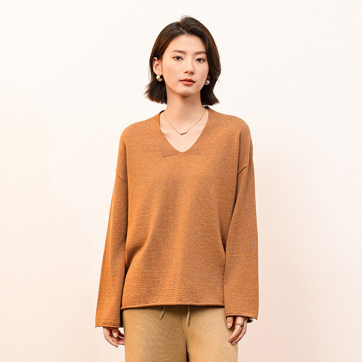 Stay cozy and stylish with the Shoton Women's Loose Basic Pullover. Made from a soft cotton-yak blend, this relaxed fit sweater is perfect for layering or wearing solo in any season.

