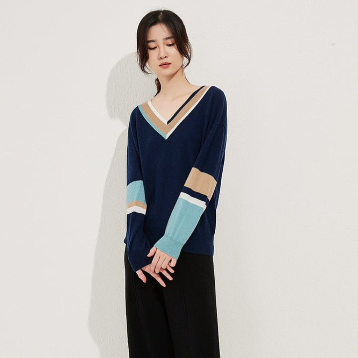 Stand out with the Himalaya Women's V-neck Colorblock Sweater. Crafted from a luxurious yak and wool blend, this stylish sweater offers exceptional warmth, softness, and a unique colorblock design. Perfect for elevating your casual wardrobe with cozy elegance.