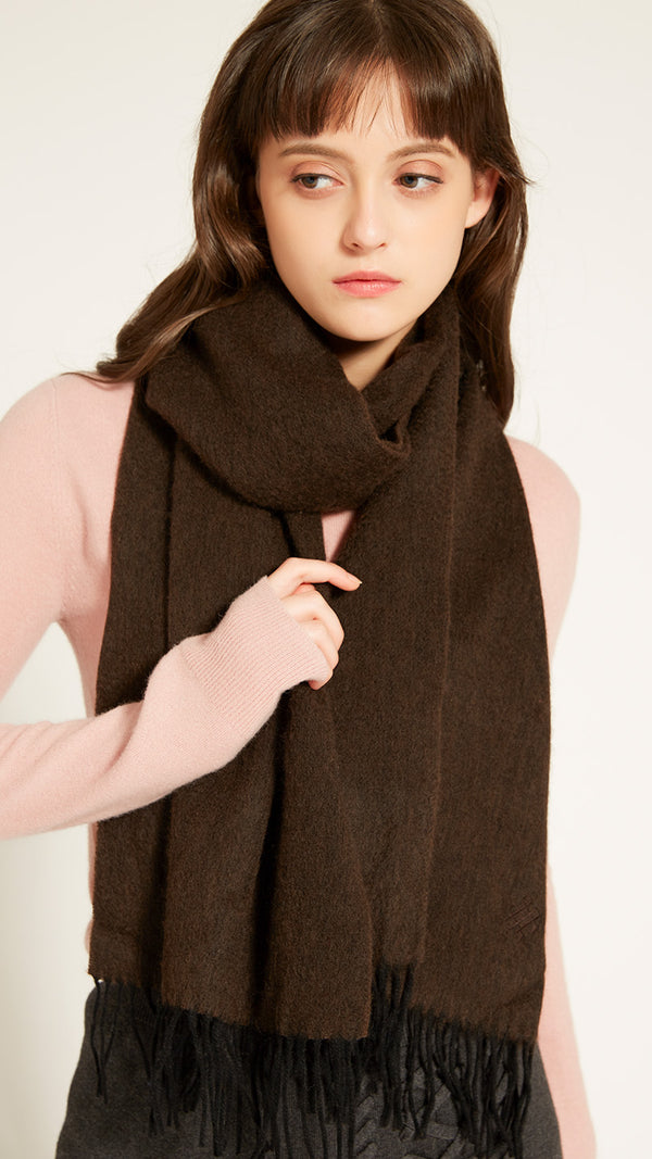 Stay warm and stylish with the Serene Yak Wool Scarf in Chocolate Brown/Nocturne. Made from 100% yak wool, it’s the perfect luxurious accessory for colder months.

