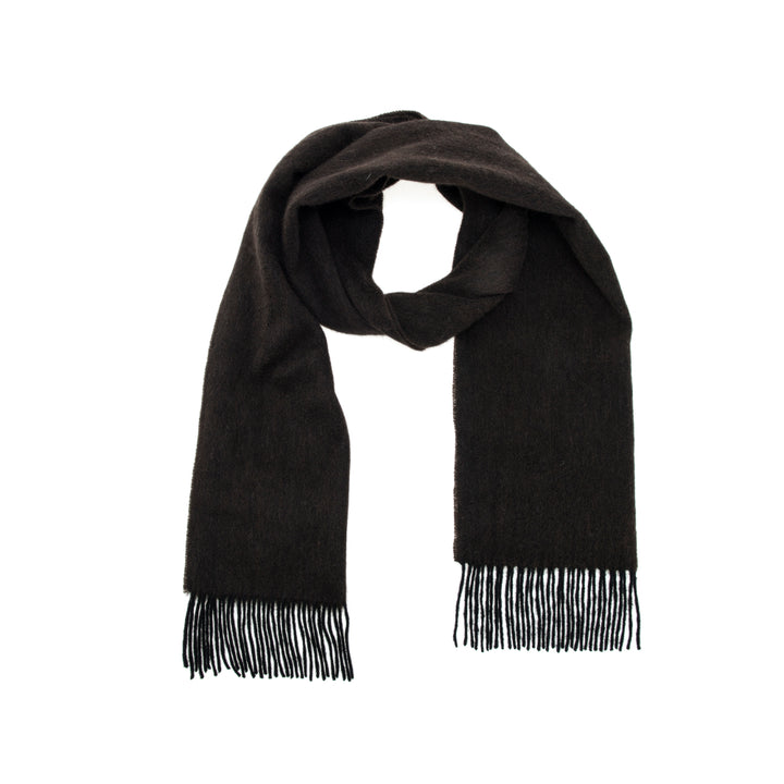 Stay warm and stylish with the Serene Yak Wool Scarf in Chocolate Brown/Nocturne. Made from 100% yak wool, it’s the perfect luxurious accessory for colder months.


