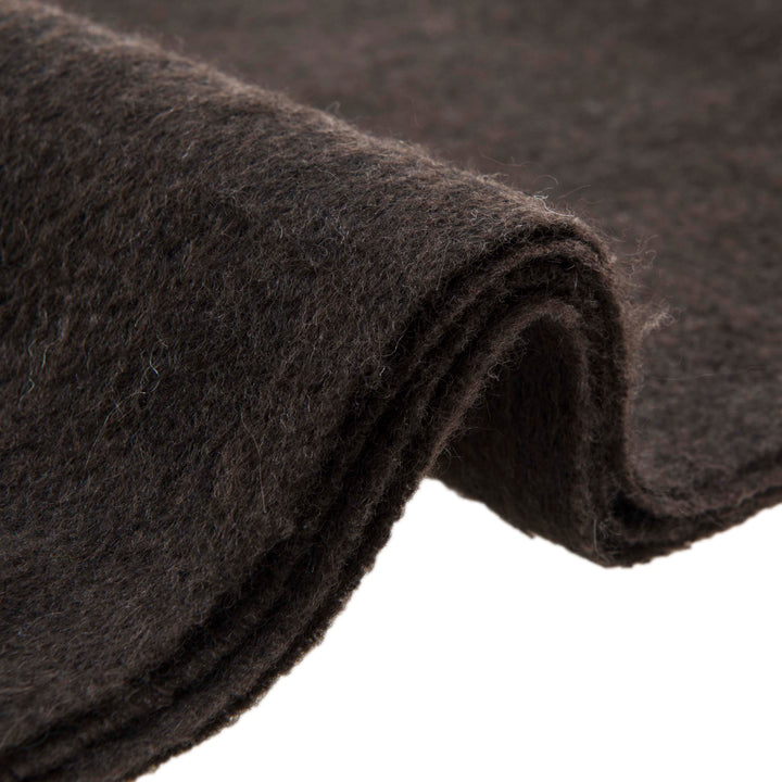 Stay warm and stylish with the Serene Yak Wool Scarf in Chocolate Brown/Nocturne. Made from 100% yak wool, it’s the perfect luxurious accessory for colder months.

