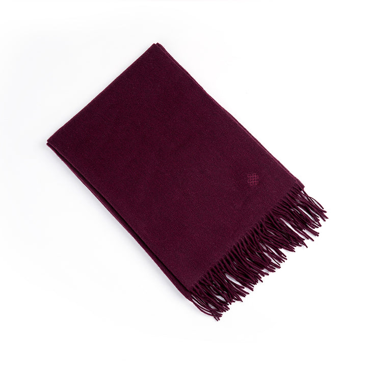 Add a pop of color with the Serene Yak Wool Scarf in Cranberry. Made from 100% yak wool, this soft and warm scarf is perfect for chilly days.

