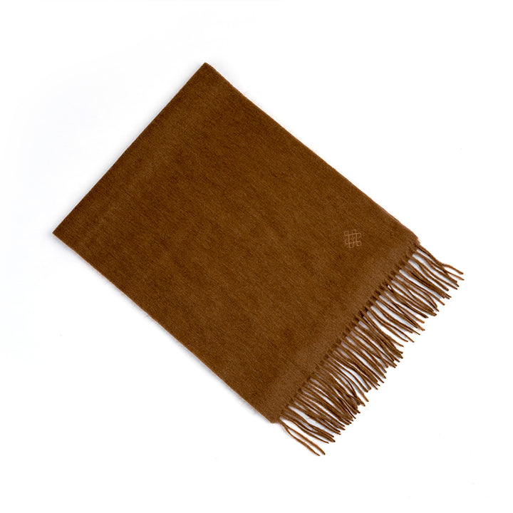 Wrap yourself in luxury with the Serene Yak Wool Scarf in Caramel. Made from 100% yak, it offers exceptional softness, warmth, and versatility for any winter outfit.

