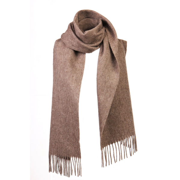 Shop the Serene Earth Yak Wool Scarf for luxurious warmth and elegance. A versatile accessory that adds timeless style and comfort to any winter outfit.

