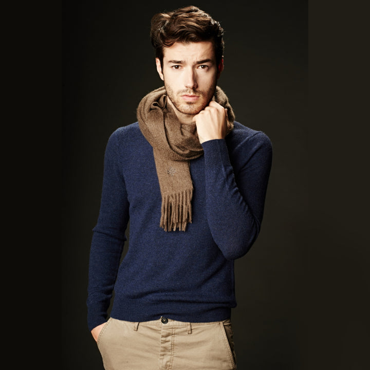 Shop the Serene Earth Yak Wool Scarf for luxurious warmth and elegance. A versatile accessory that adds timeless style and comfort to any winter outfit.

