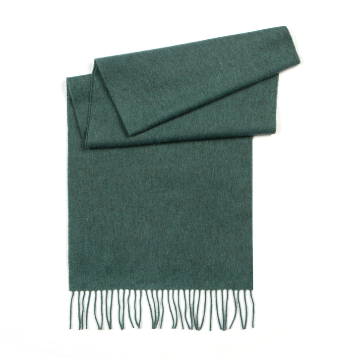 Shop the Serene Mint Yak Wool Scarf for a soft, stylish, and warm winter accessory. Perfect for adding a pop of color and luxury to any winter outfit.

