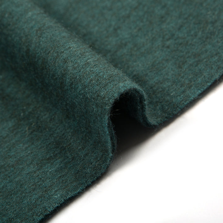 Shop the Serene Mint Yak Wool Scarf for a soft, stylish, and warm winter accessory. Perfect for adding a pop of color and luxury to any winter outfit.

