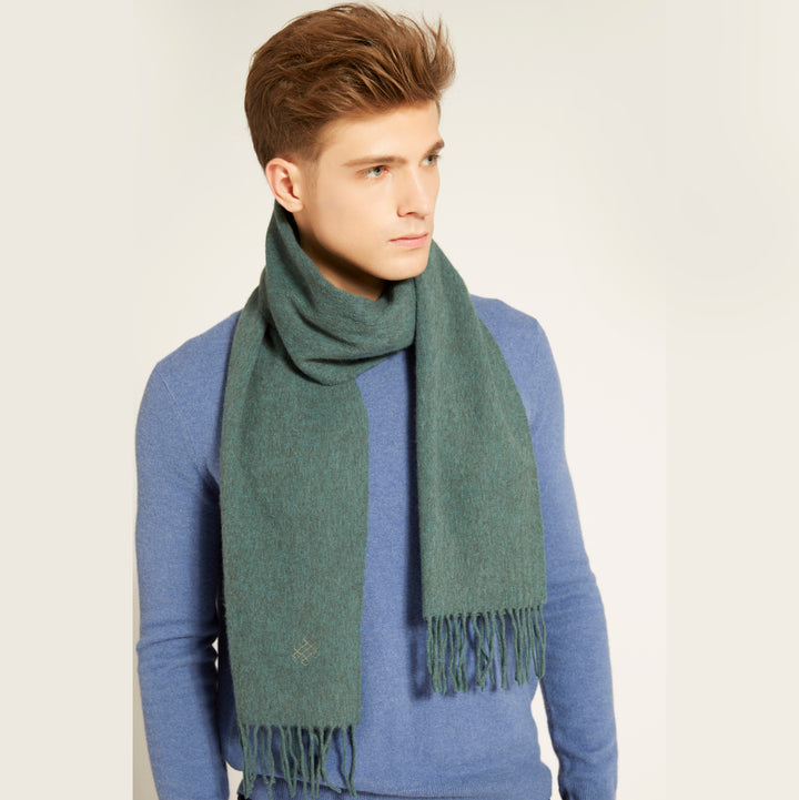 Shop the Serene Mint Yak Wool Scarf for a soft, stylish, and warm winter accessory. Perfect for adding a pop of color and luxury to any winter outfit.

