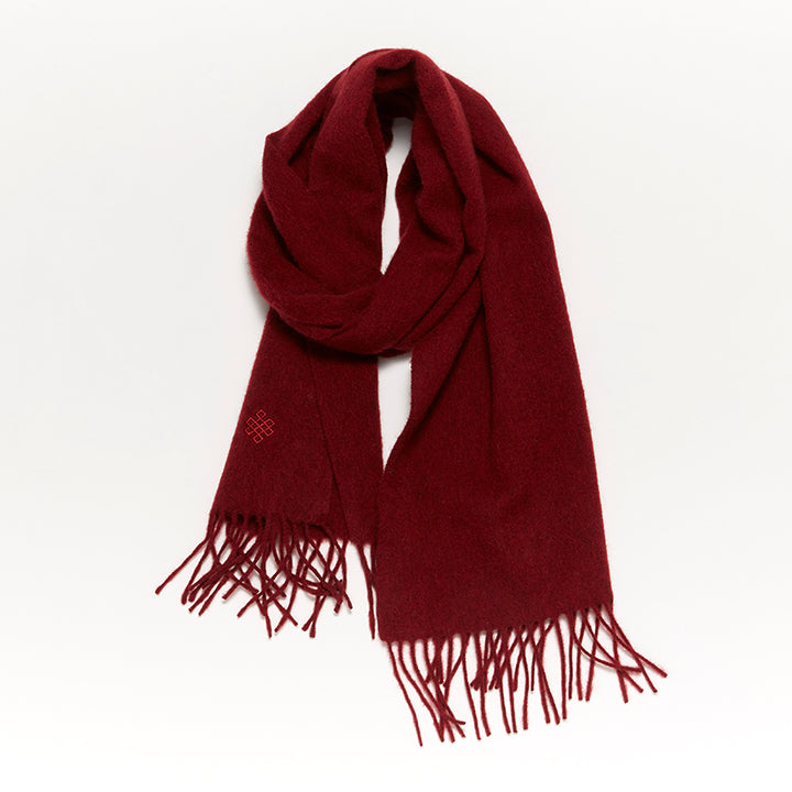 Shop the Serene Pomegranate Yak Wool Scarf for a vibrant and luxurious winter accessory. Soft, warm, and perfect for adding color to your cold-weather wardrobe.

