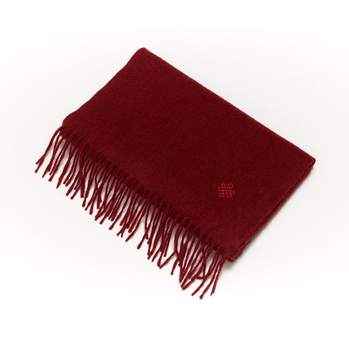 Shop the Serene Pomegranate Yak Wool Scarf for a vibrant and luxurious winter accessory. Soft, warm, and perfect for adding color to your cold-weather wardrobe.

