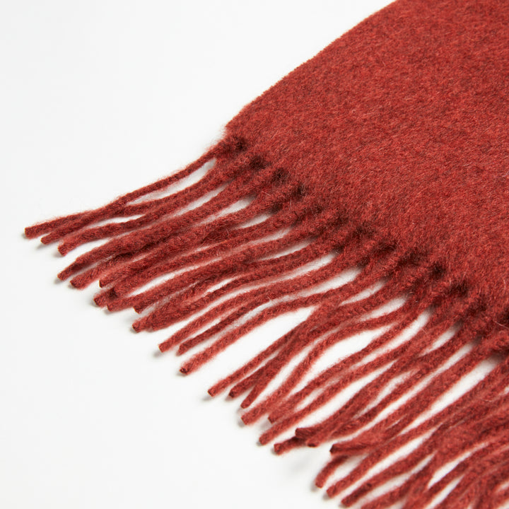 Discover the Serene Rust Yak Wool Scarf for a cozy, luxurious addition to your winter wardrobe. Soft, warm, and stylish – the perfect cold-weather accessory.

