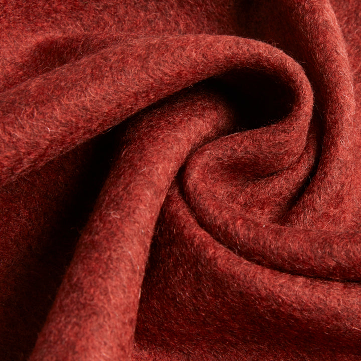Discover the Serene Rust Yak Wool Scarf for a cozy, luxurious addition to your winter wardrobe. Soft, warm, and stylish – the perfect cold-weather accessory.

