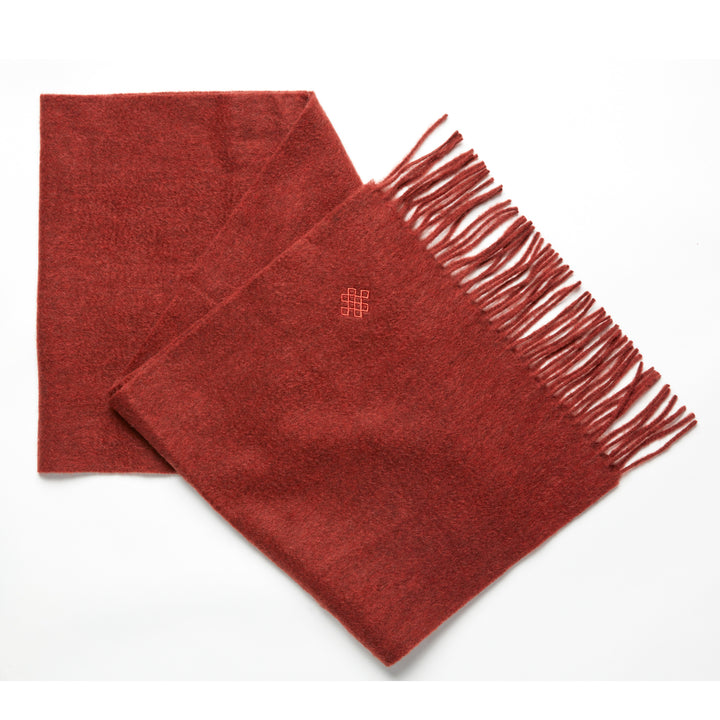 Discover the Serene Rust Yak Wool Scarf for a cozy, luxurious addition to your winter wardrobe. Soft, warm, and stylish – the perfect cold-weather accessory.

