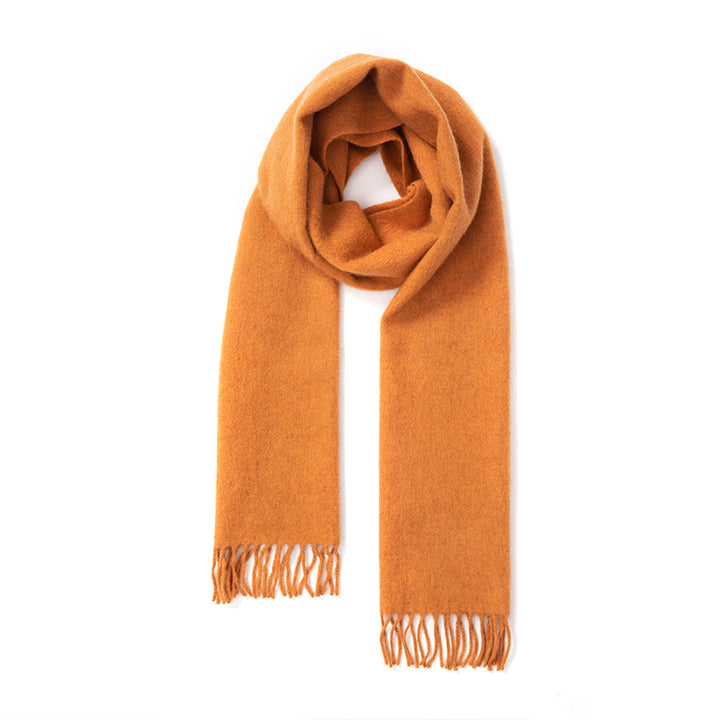 Experience ultimate comfort and warmth with the Serene Sugar Graham Scarf. Crafted from 100% yak wool, it's the perfect luxurious accessory for colder months.

