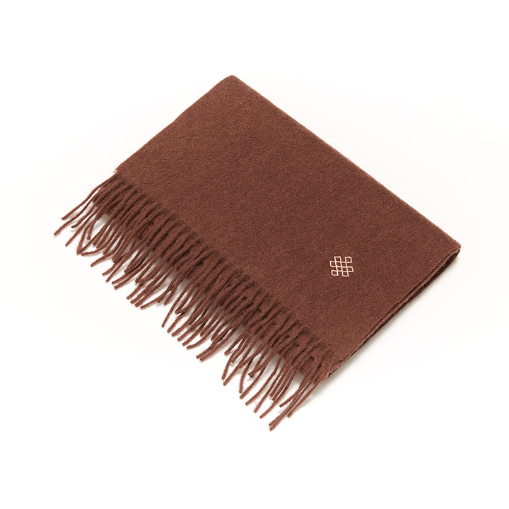 Experience ultimate comfort and warmth with the Serene Sugar Graham Scarf. Crafted from 100% yak wool, it's the perfect luxurious accessory for colder months.


