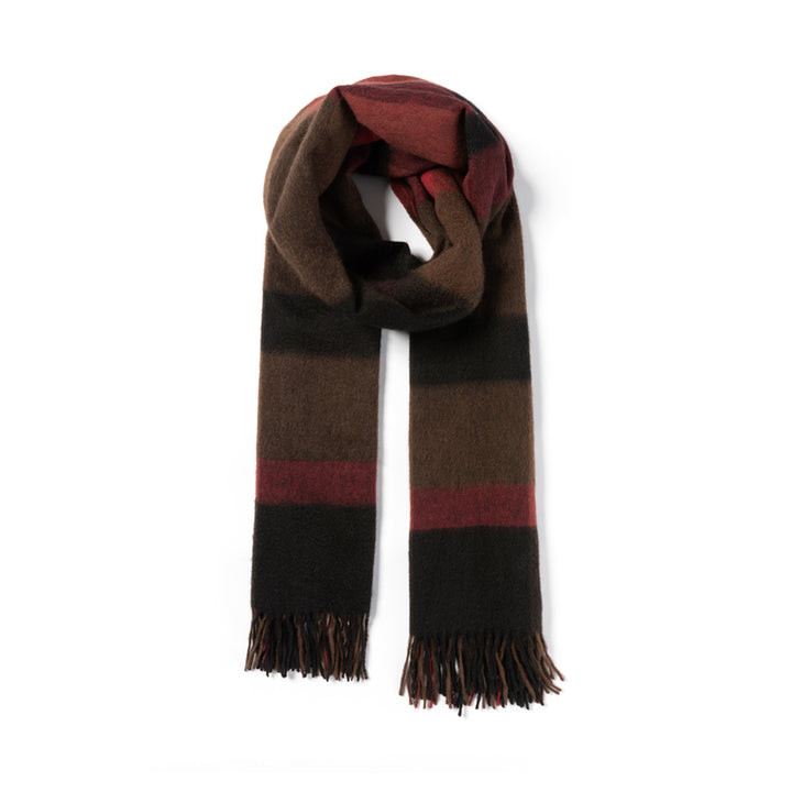 Wrap yourself in luxury with the Serene Plaid Shawl. Made from 100% yak wool, this soft, warm accessory in classic hues adds elegance to any winter outfit.

