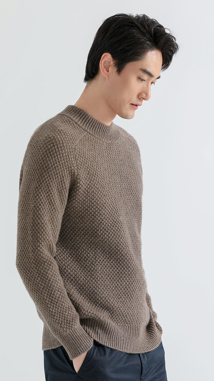 Discover luxury and warmth with the Shambala Half High Collar Spruce Seed Yak Wool Pullover. Made from 100% yak wool, this sweater offers a soft, cozy fit, perfect for cold weather styling.

