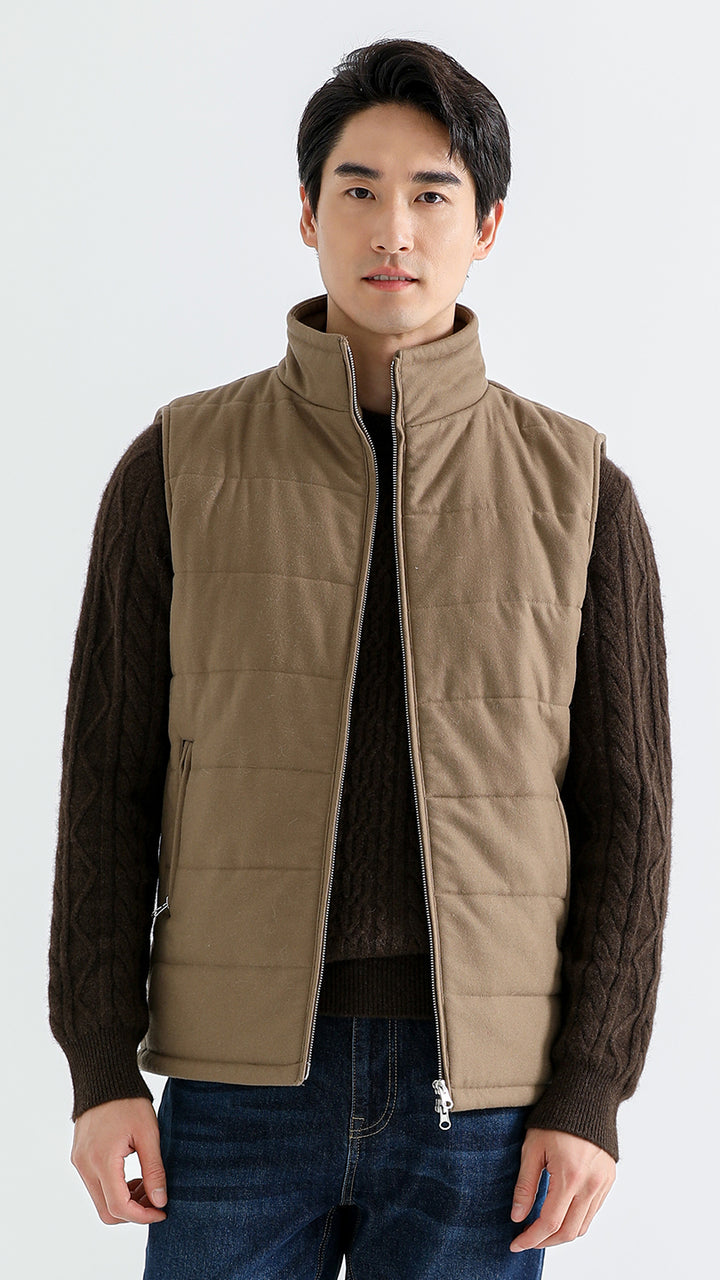 Elevate your winter wardrobe with the Men's Grassland Quilted Yak Wool Vest. Made from premium yak wool, this quilted vest offers superior warmth and style for cold weather. Available in multiple sizes. Perfect for layering or as an outer piece for versatile, cozy styling.