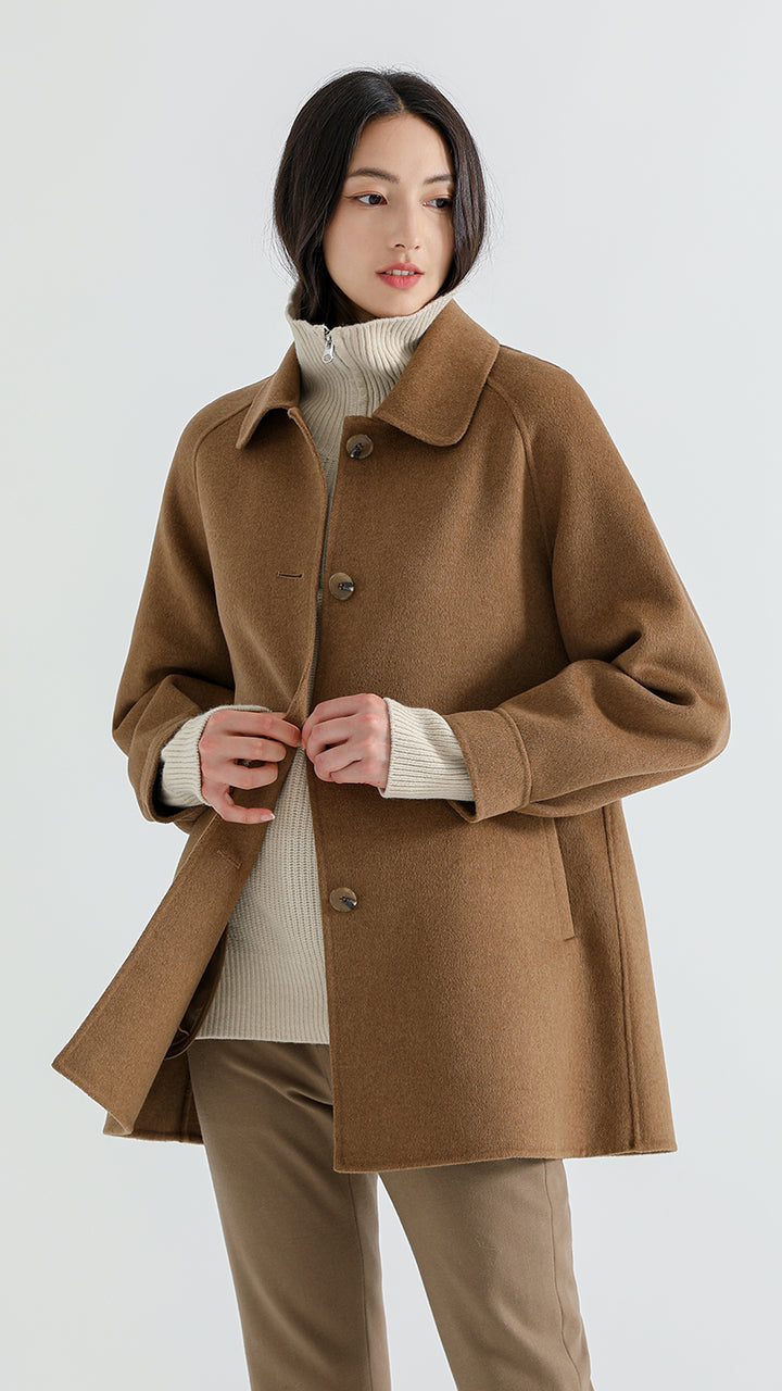 Stay stylish and warm with the Women's Shambala Reversible Lapel Yak Wool Coat. Crafted from premium Yak wool, this reversible coat offers two elegant looks in one, making it the perfect addition to your winter wardrobe.