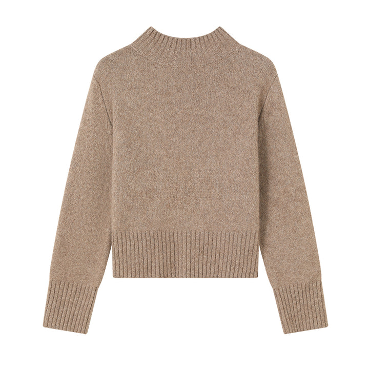 Elevate your wardrobe with the Above Land Cropped Sweater. Made from a luxurious yak wool blend, this stylish and cozy piece offers a relaxed fit, perfect for layering. A versatile design that combines comfort with modern flair.