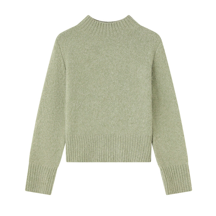 Elevate your wardrobe with the Above Land Cropped Sweater. Made from a luxurious yak wool blend, this stylish and cozy piece offers a relaxed fit, perfect for layering. A versatile design that combines comfort with modern flair.