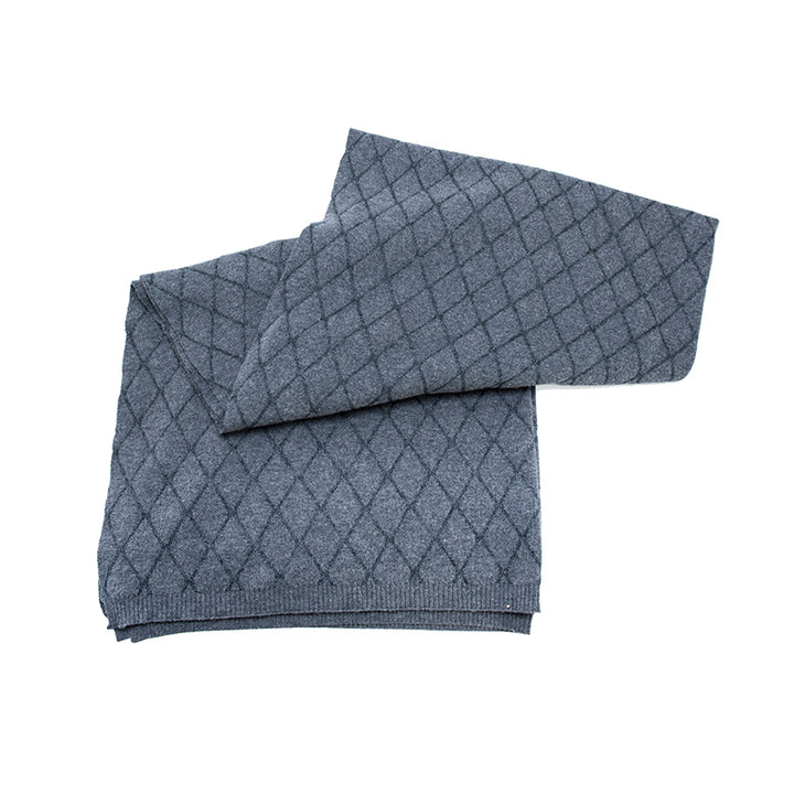 Travel in comfort and style with the Shoton Multi-use Travel Pillow/Throw. Featuring a chic diamond pattern and crafted from luxurious yak wool, it offers versatility, warmth, and elegance on the go.

