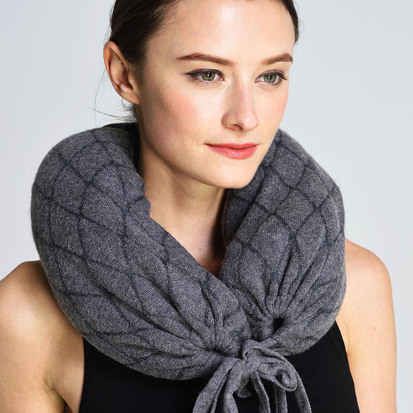 Travel in comfort and style with the Shoton Multi-use Travel Pillow/Throw. Featuring a chic diamond pattern and crafted from luxurious yak wool, it offers versatility, warmth, and elegance on the go.


